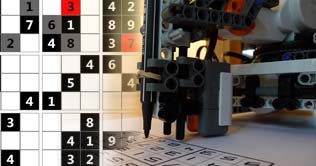Robot solves Sudoku puzzle